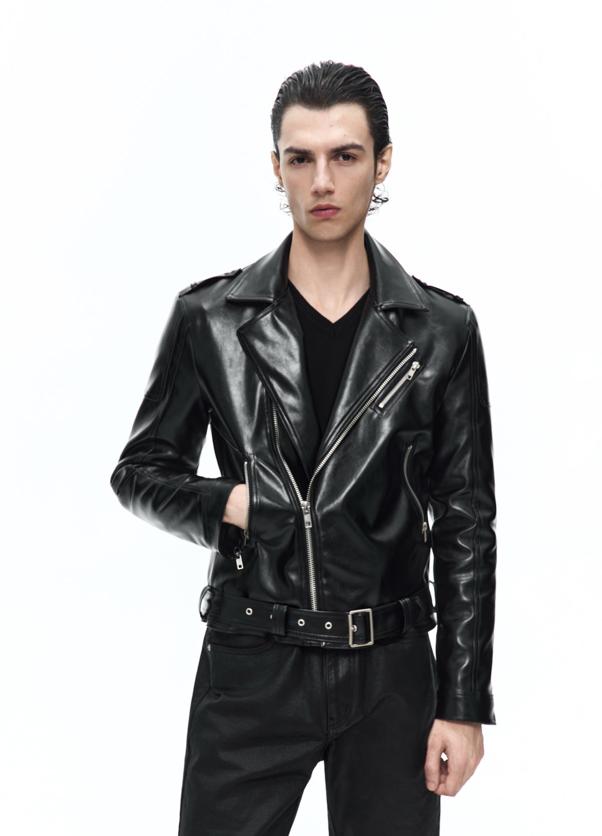 Closer front view of the zipped black biker jacket, showing the diagonal closure, wide lapels and buckled waist belt.