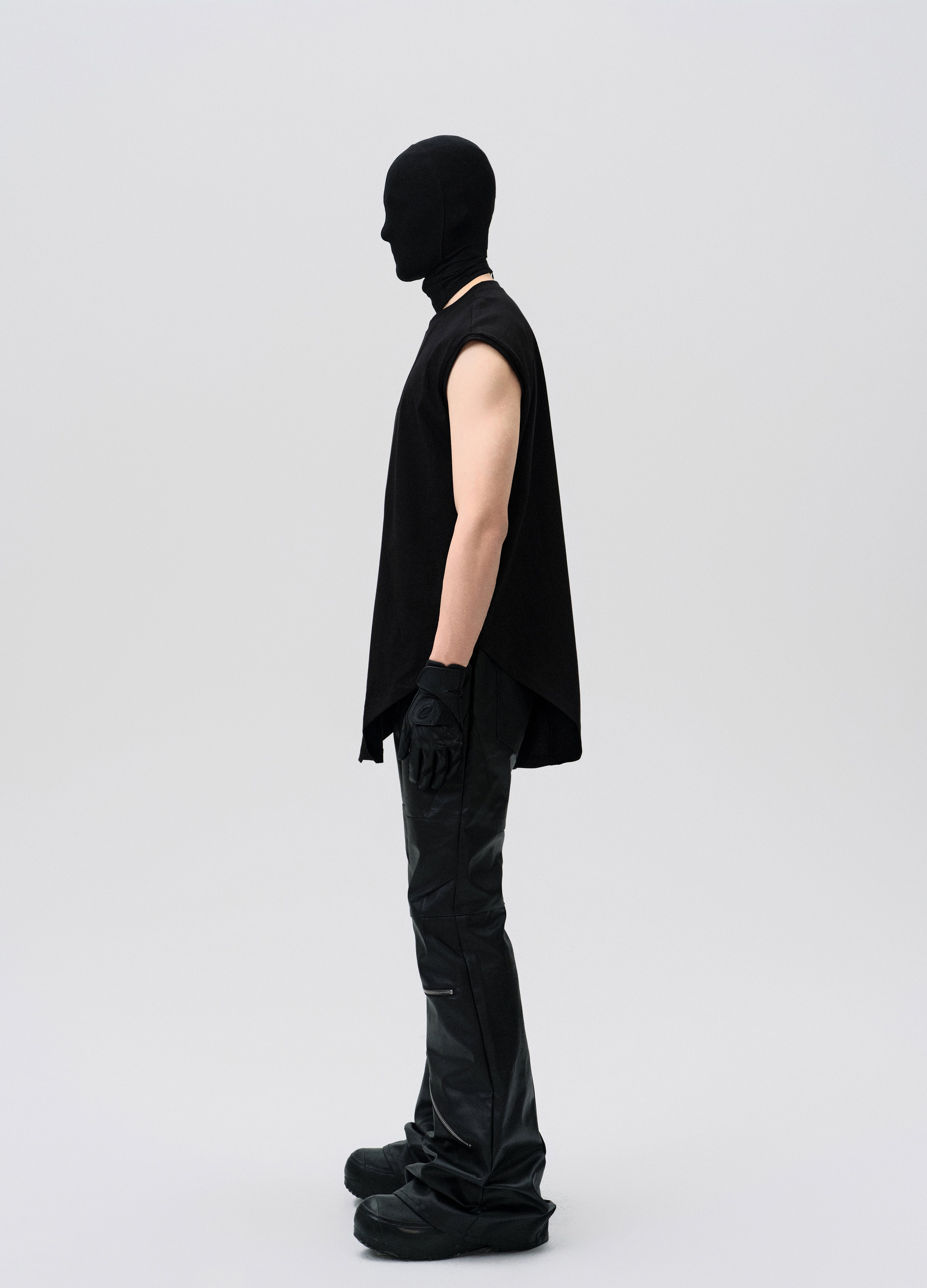 PANTALONI DECOSTRUITI CON ZIP CERATA 25SS