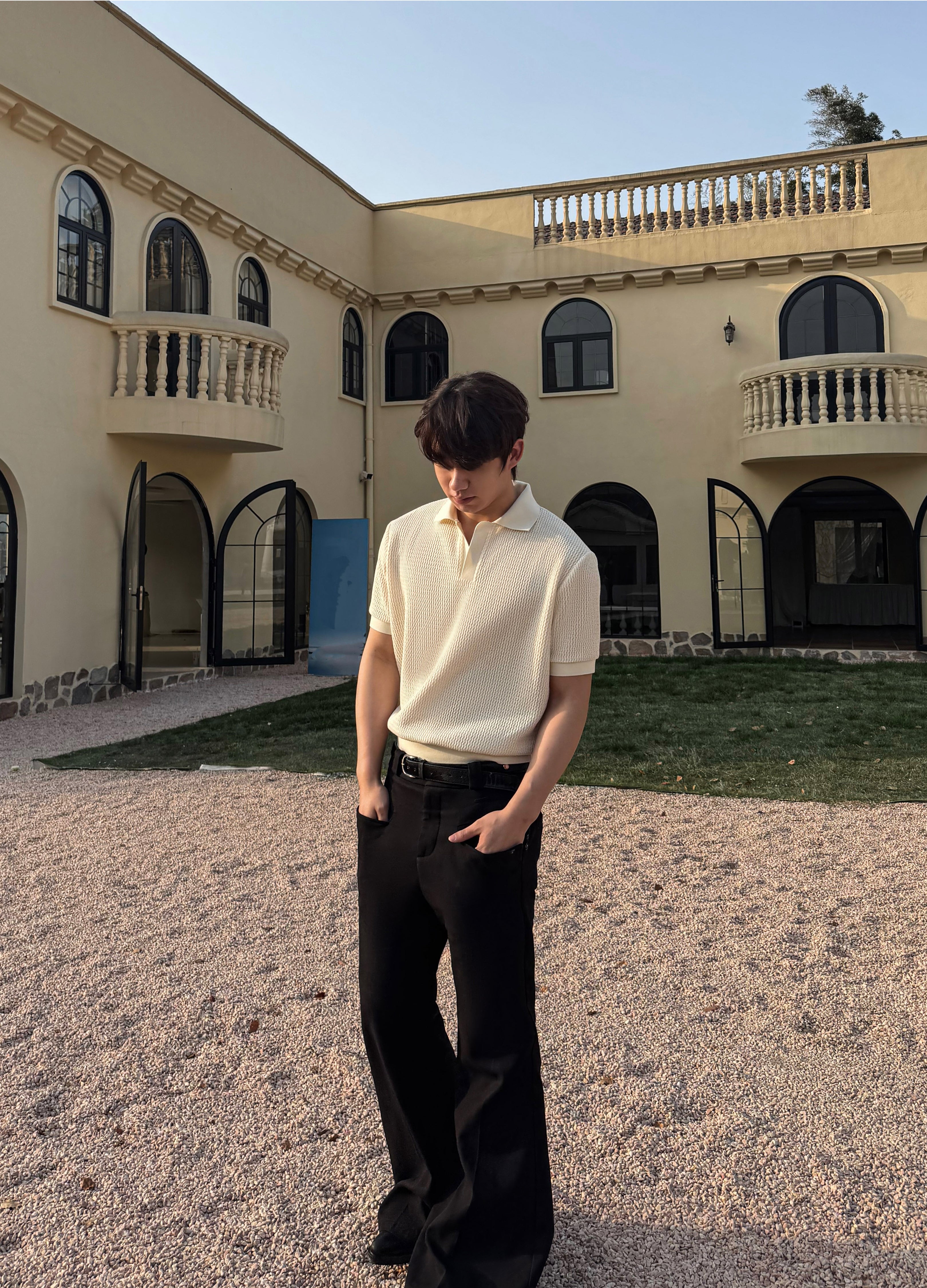 POLO JACQUARD CON SCOLLO A V 25SS