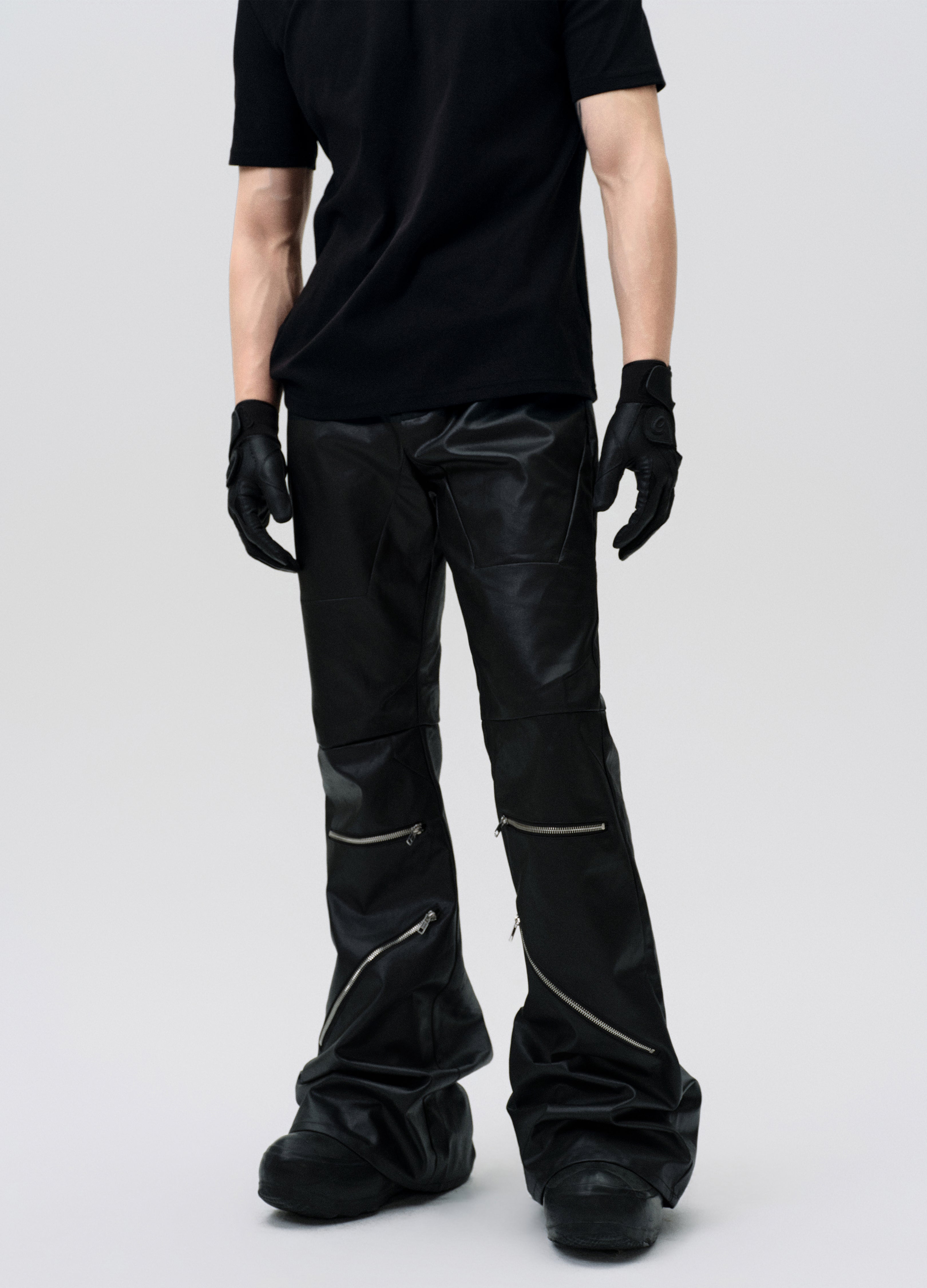 PANTALONI DECOSTRUITI CON ZIP CERATA 25SS