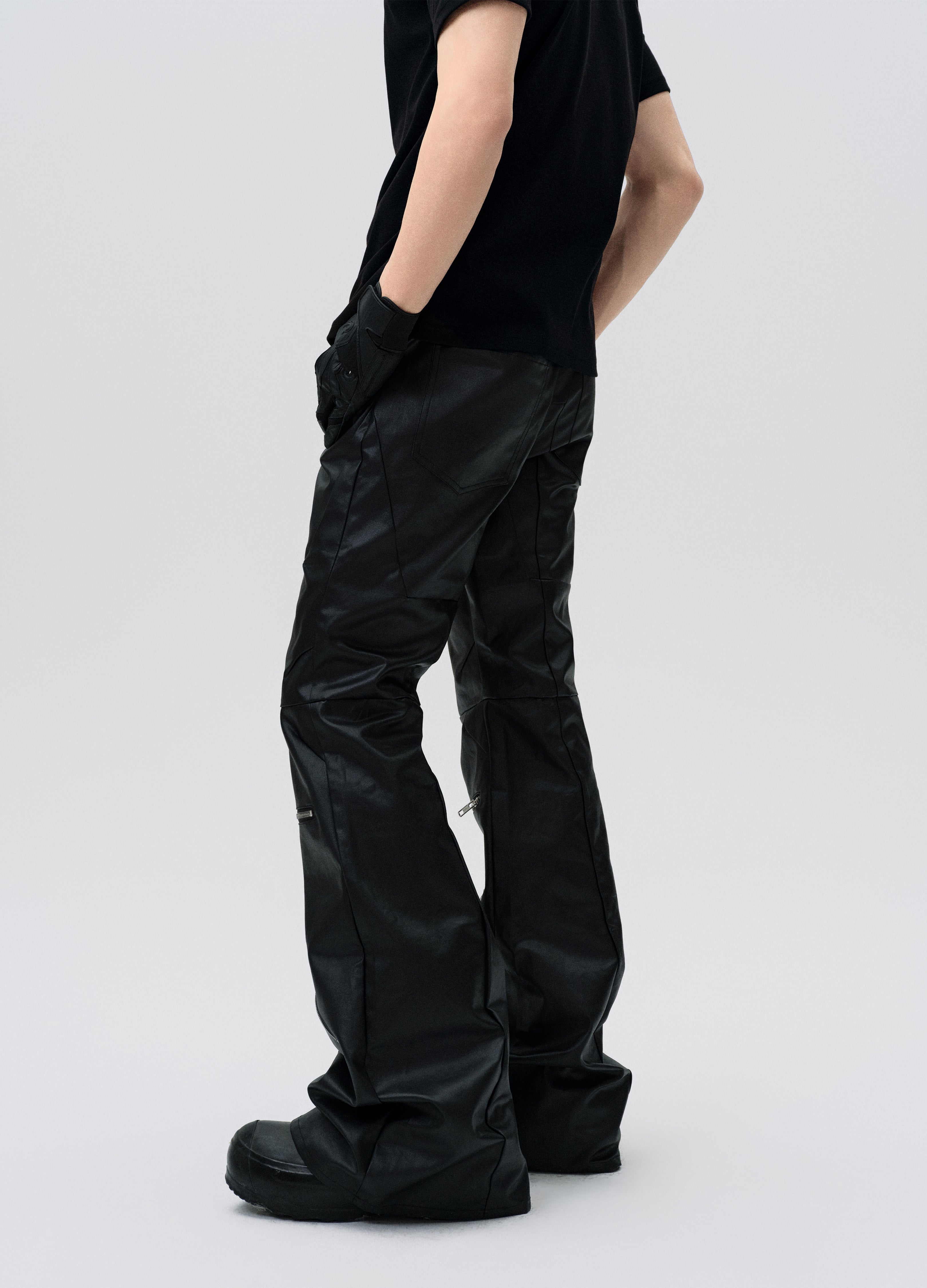 PANTALONI DECOSTRUITI CON ZIP CERATA 25SS