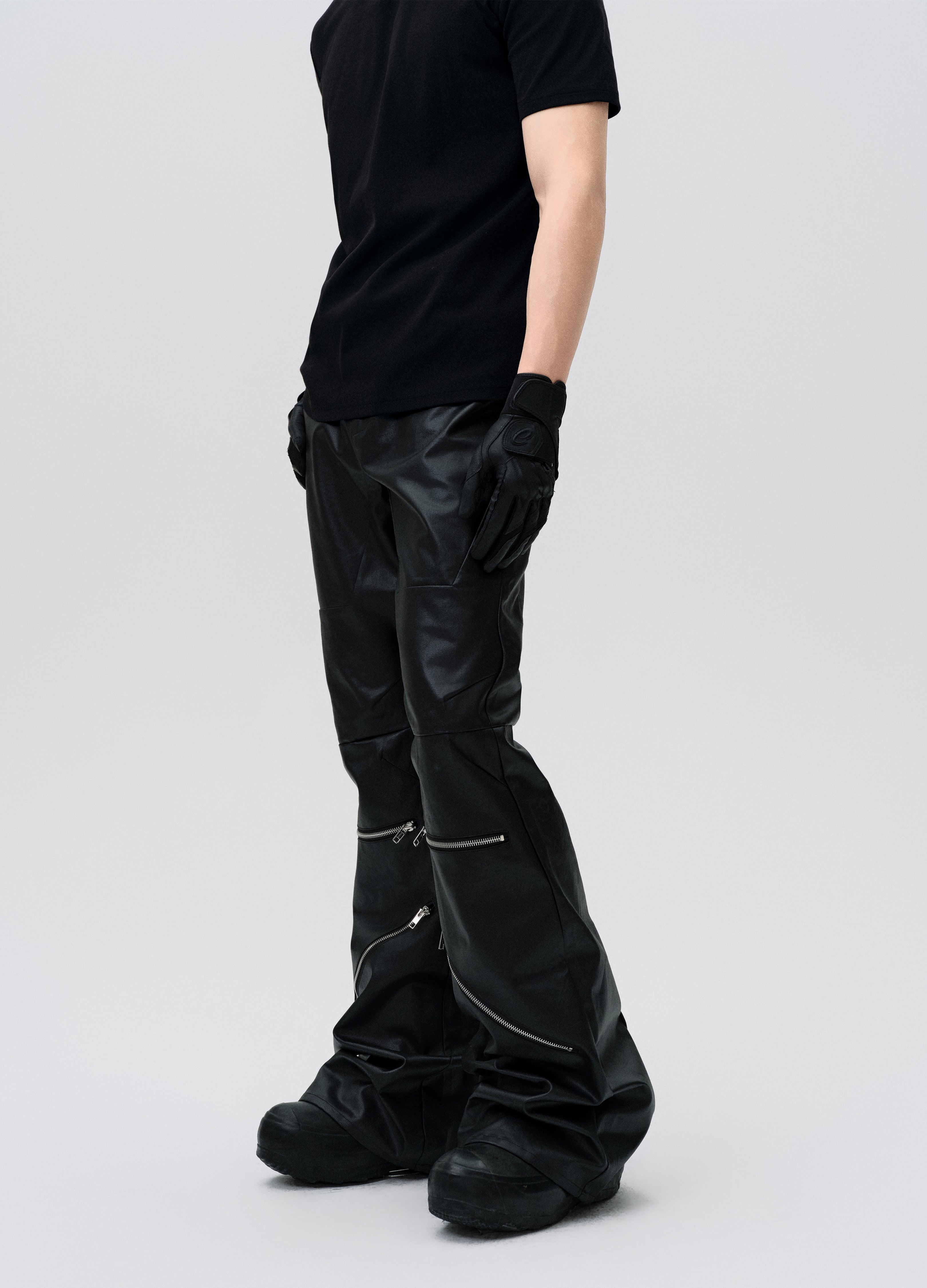 PANTALONI DECOSTRUITI CON ZIP CERATA 25SS