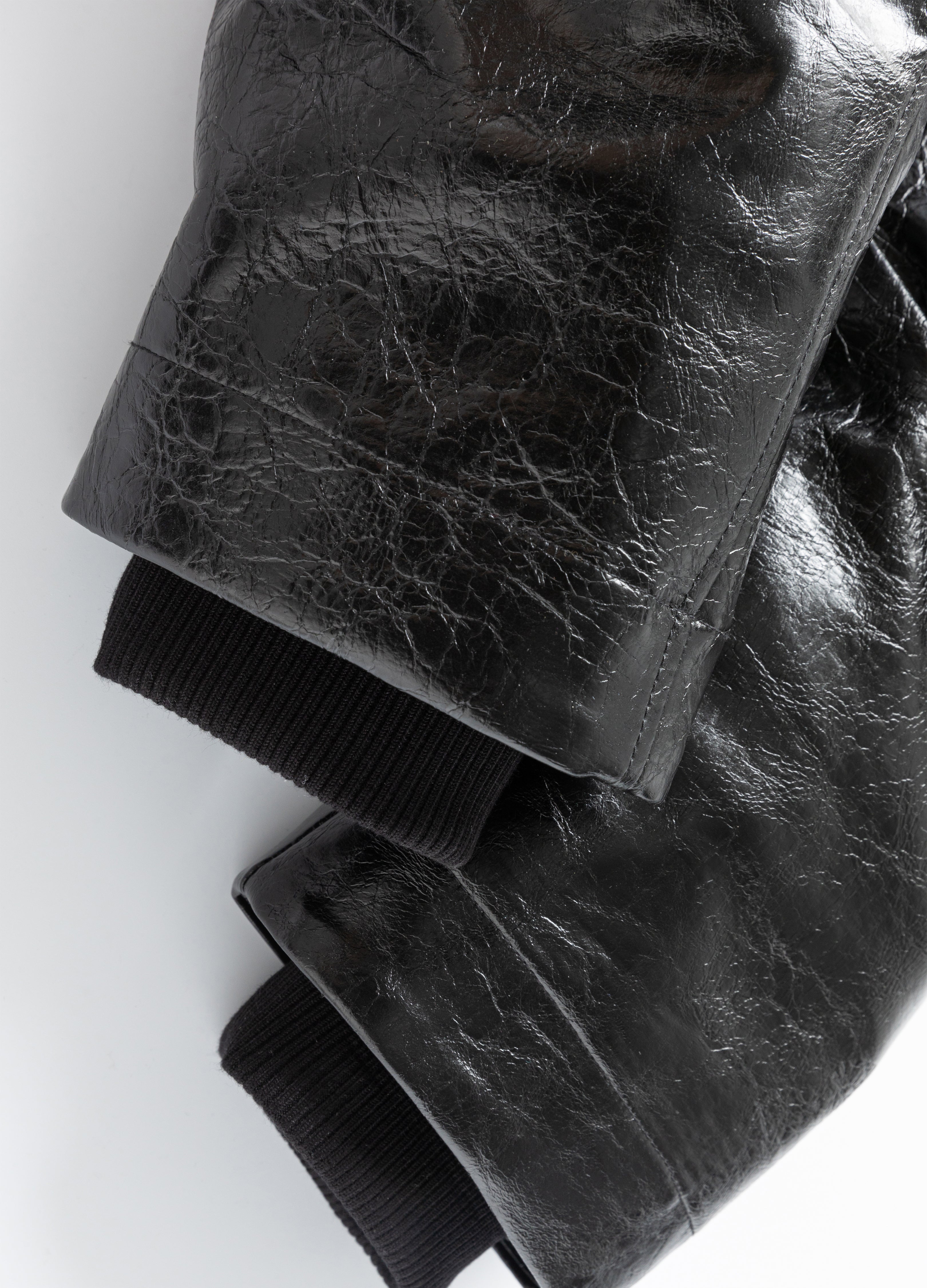 GIACCA IMBOTTITA IN PELLE PLISSETTATA 25FW