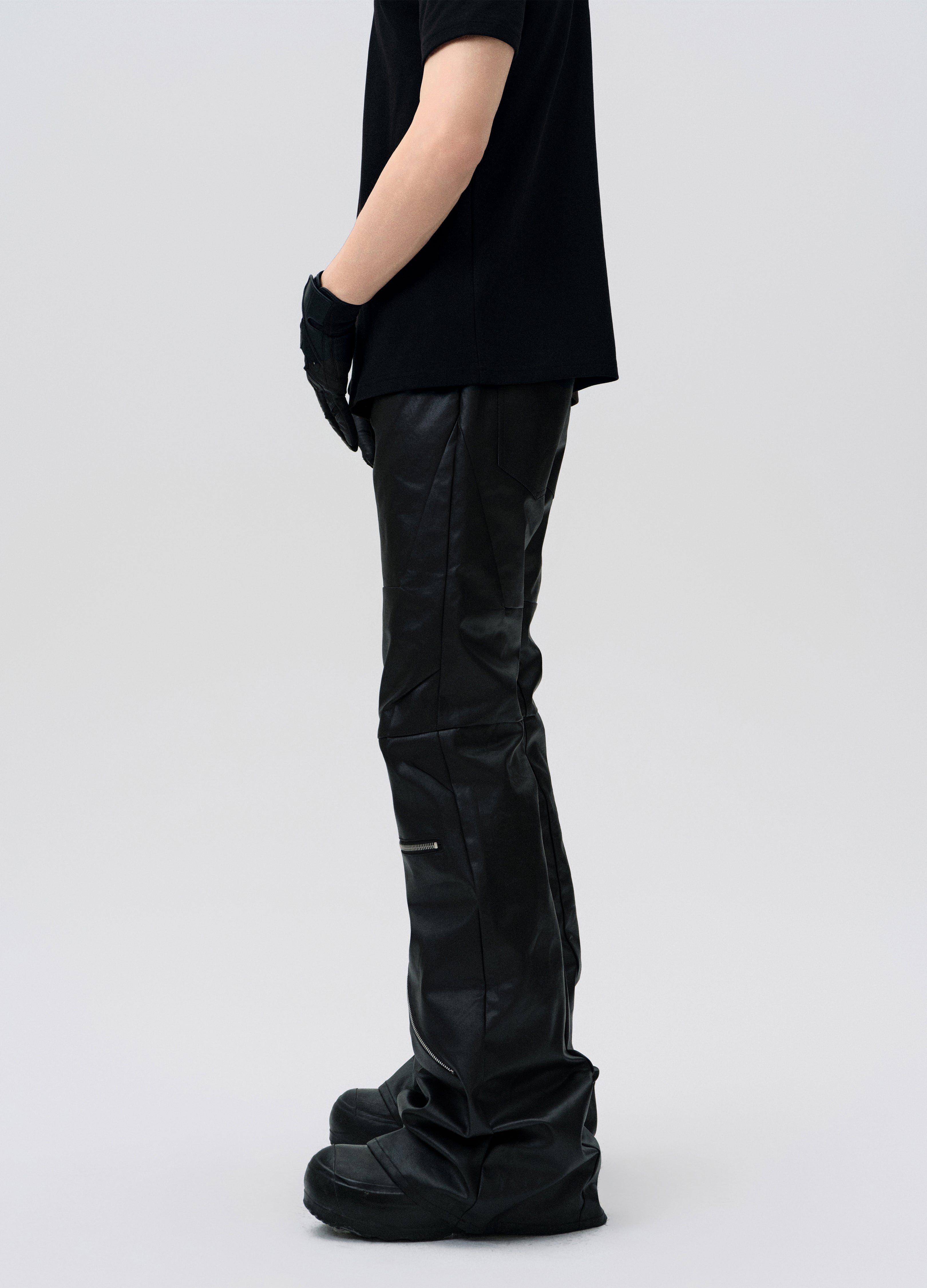 PANTALONI DECOSTRUITI CON ZIP CERATA 25SS