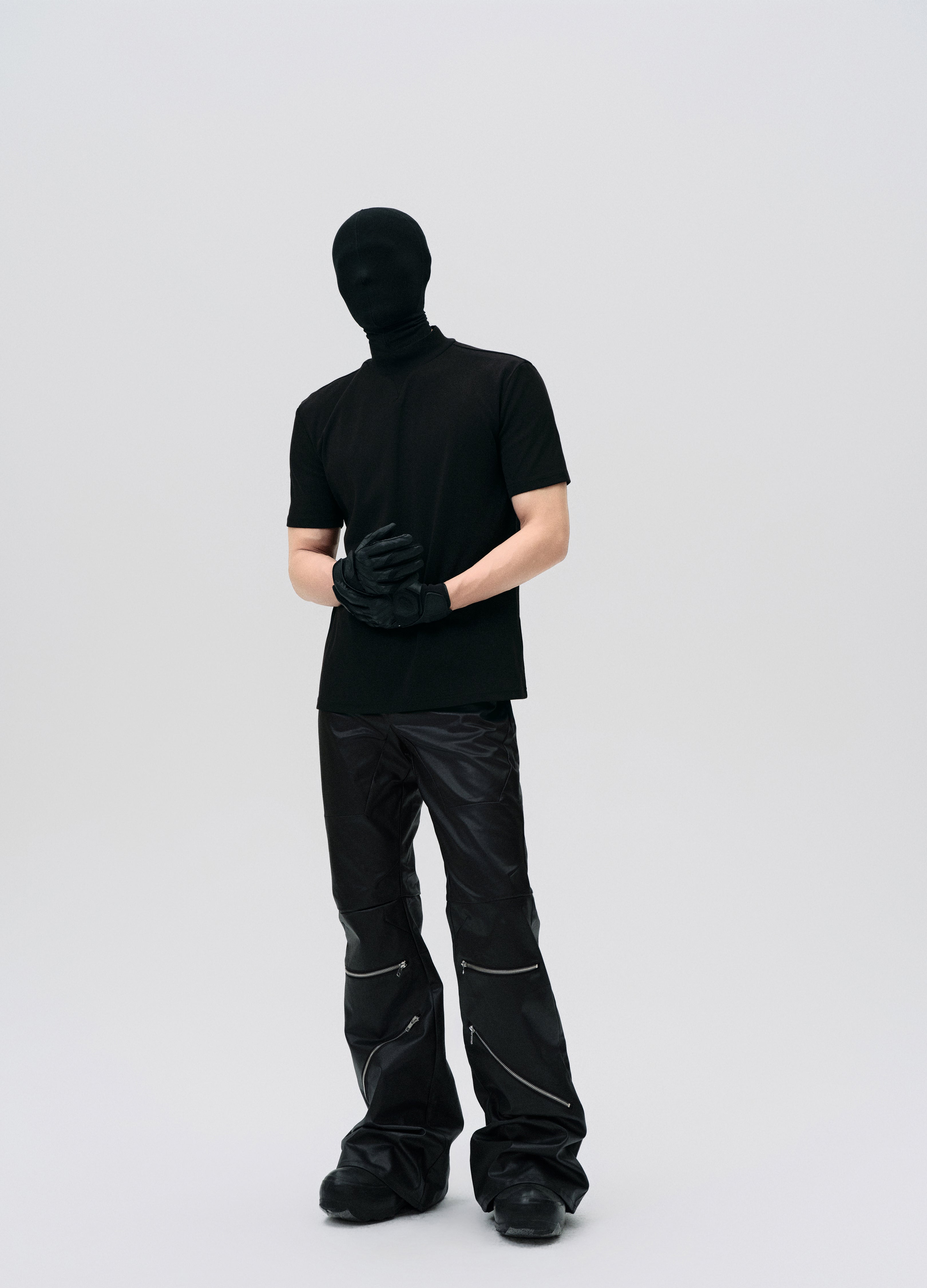 PANTALONI DECOSTRUITI CON ZIP CERATA 25SS