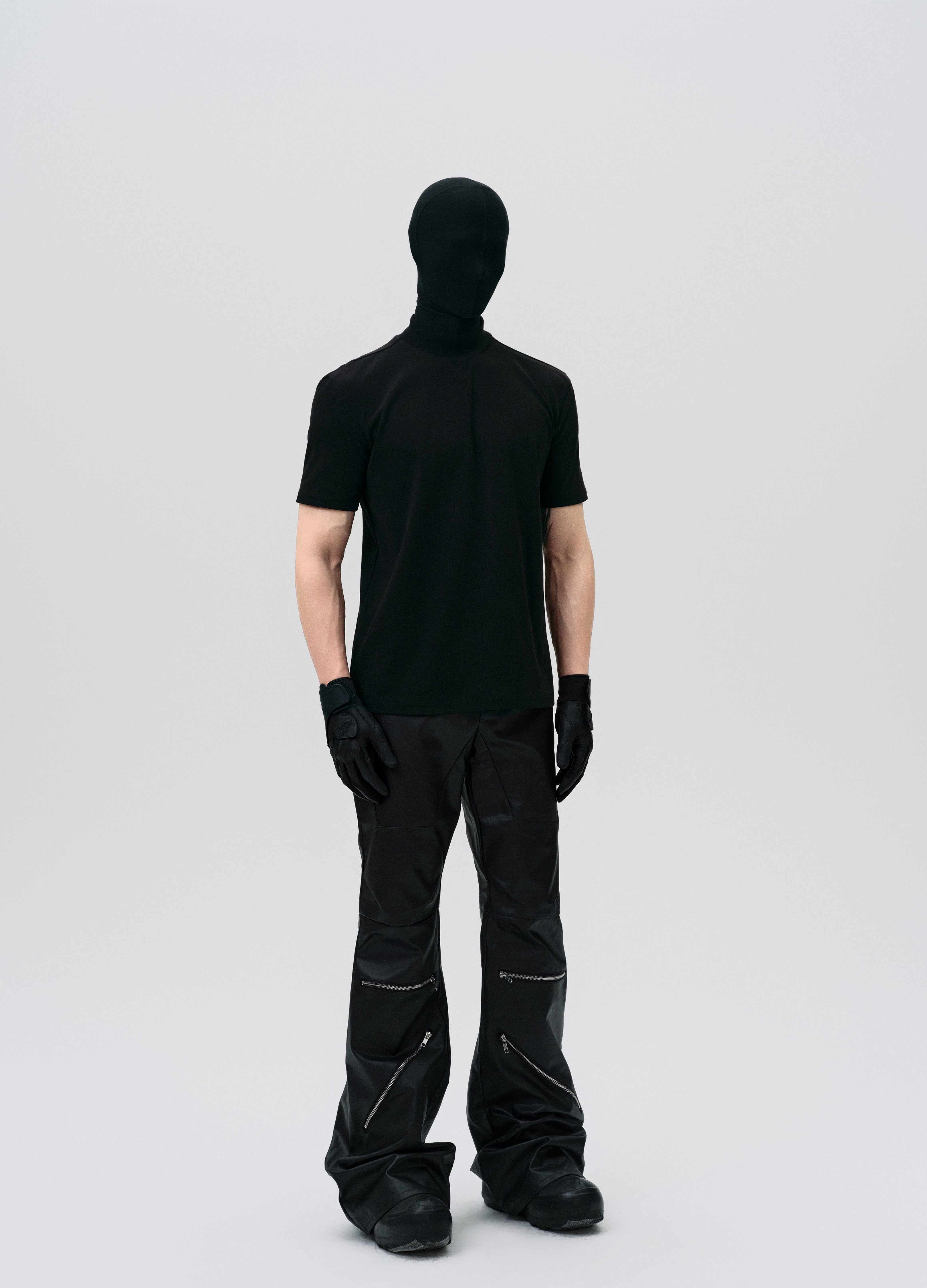 PANTALONI DECOSTRUITI CON ZIP CERATA 25SS