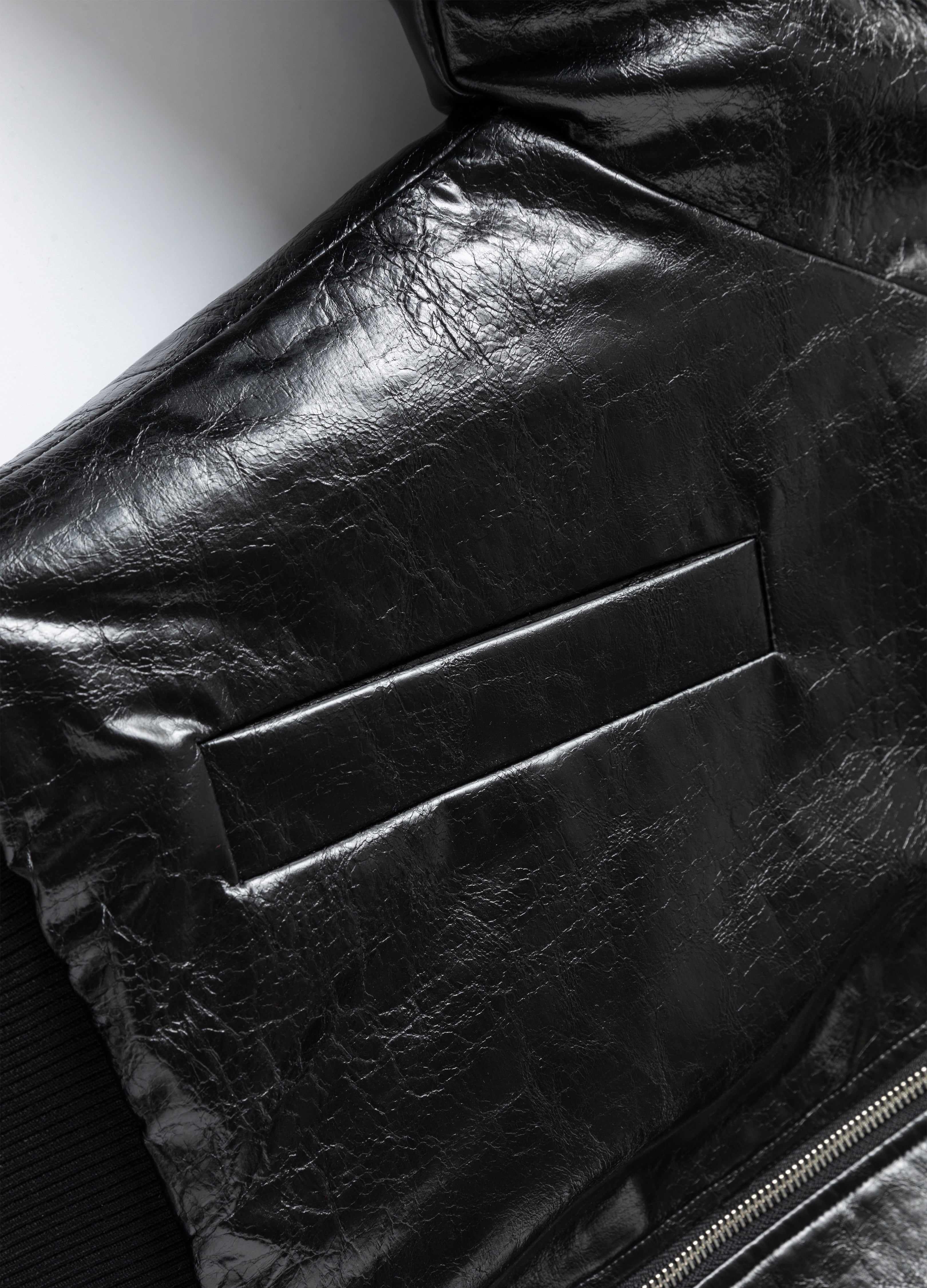 GIACCA IMBOTTITA IN PELLE PLISSETTATA 25FW