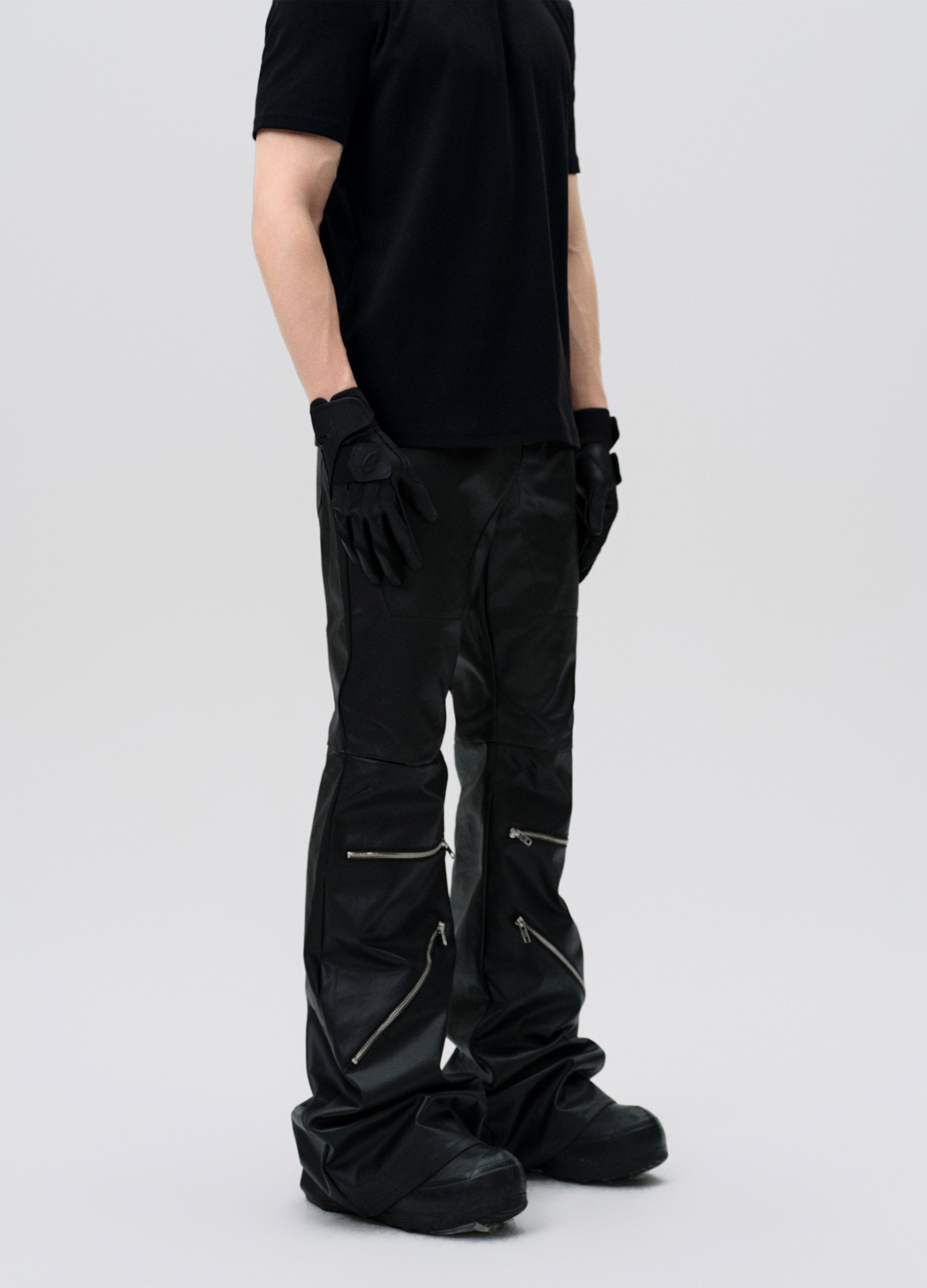 PANTALONI DECOSTRUITI CON ZIP CERATA 25SS