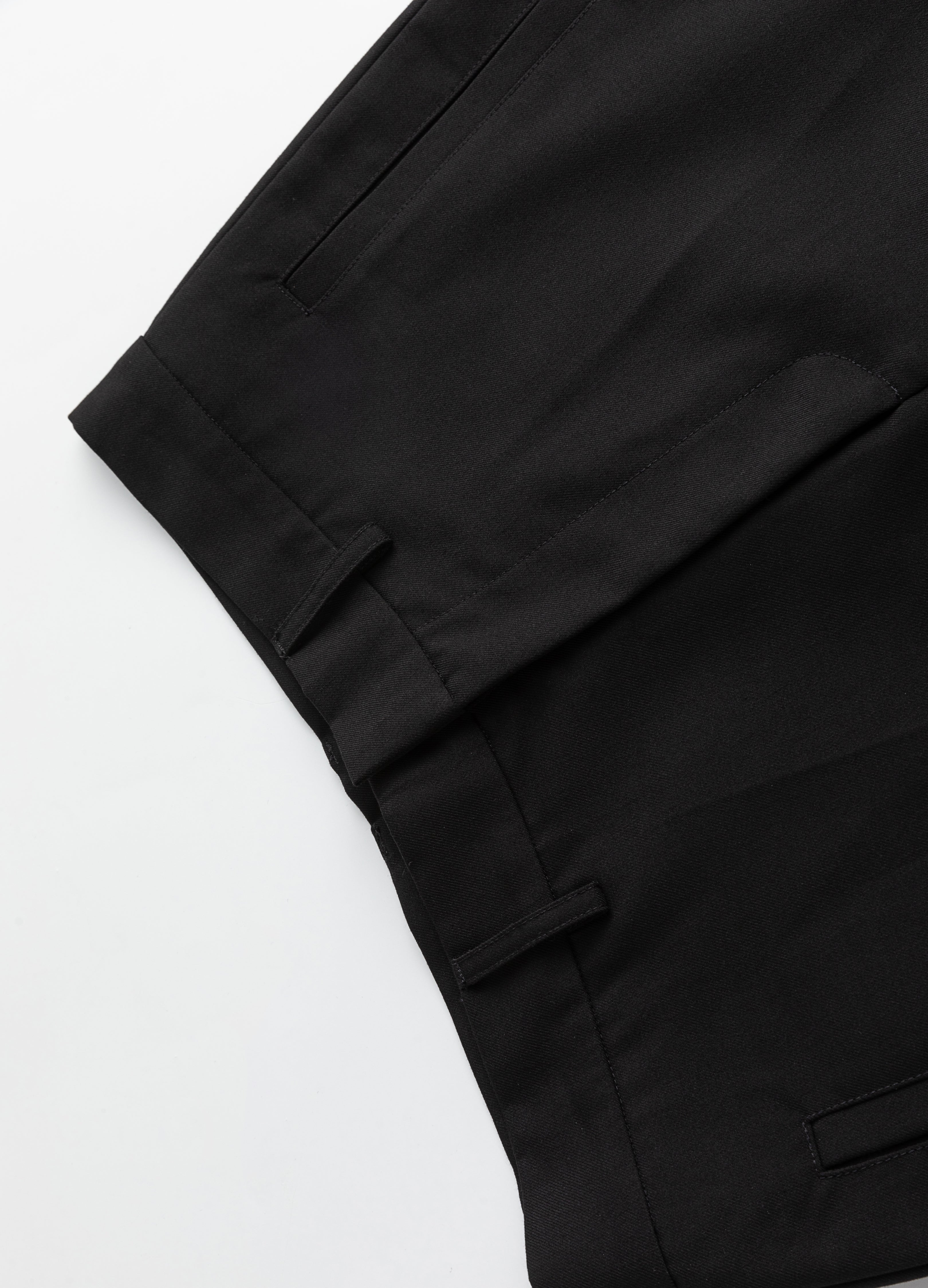 Pantaloni con spacchi e orlo a micro-stivale 23FW