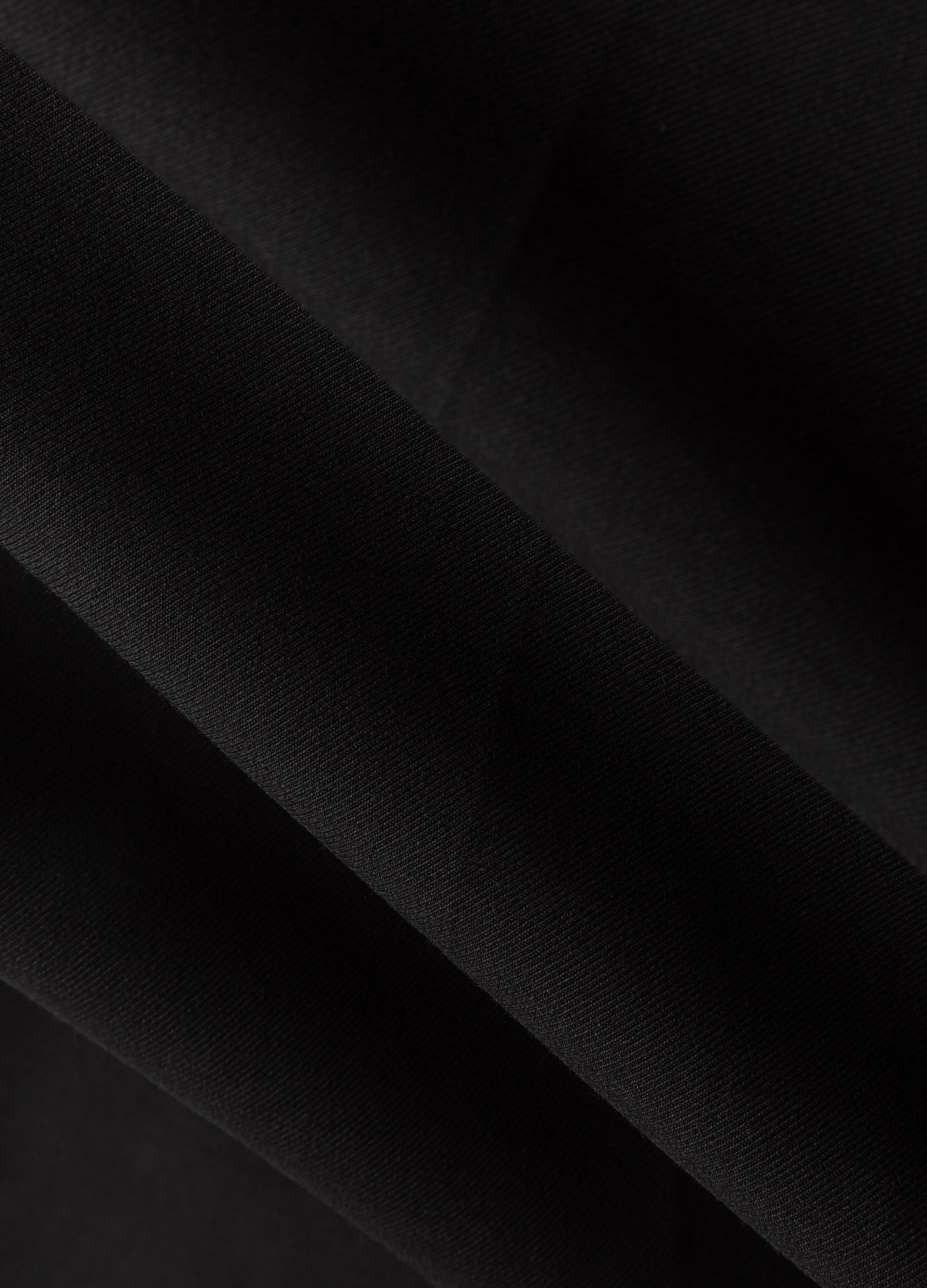 Pantaloni con spacchi e orlo a micro-stivale 23FW