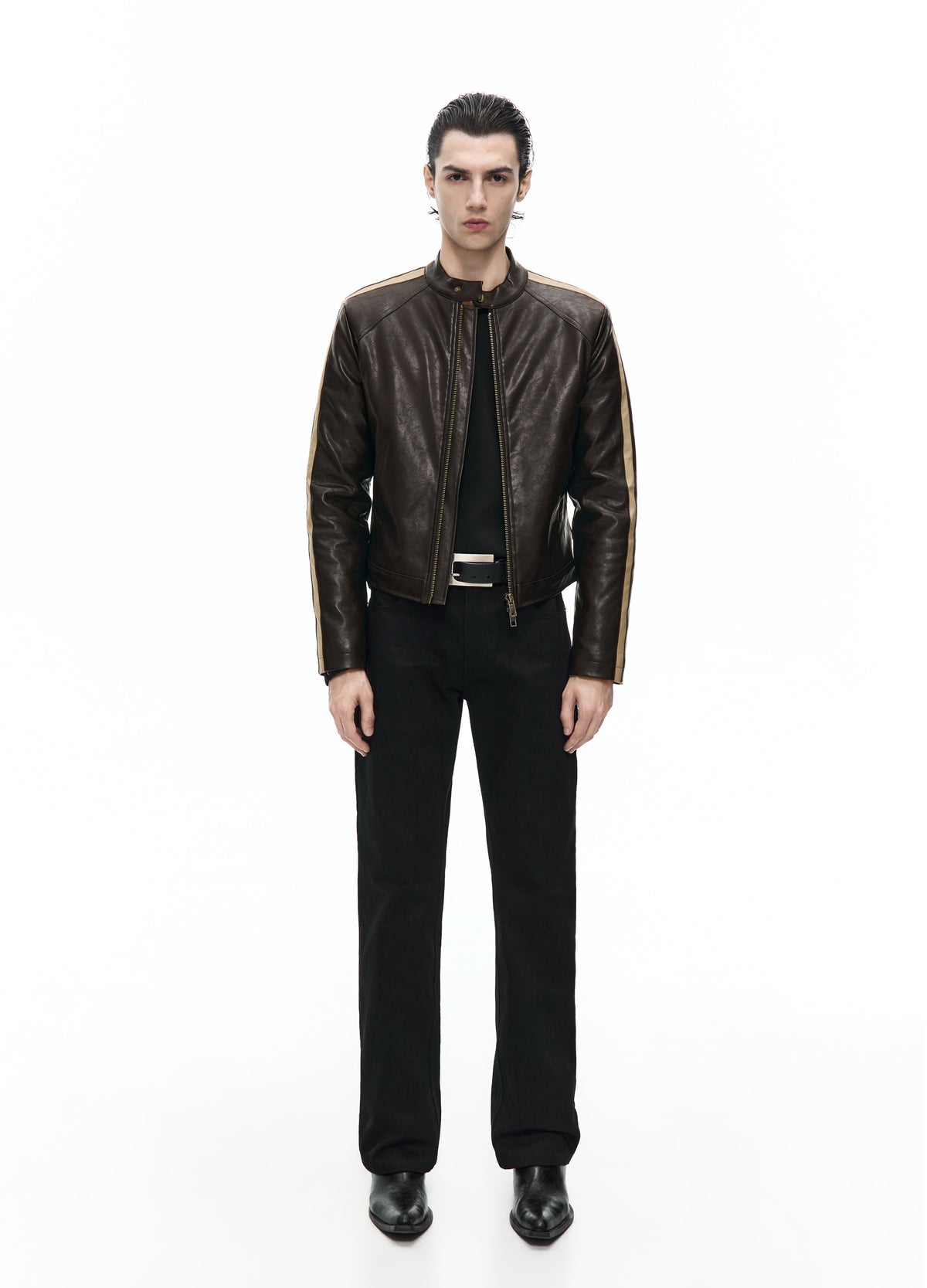 Front view of a model in a dark brown jacket worn open, with a short stand collar and pale stripes along the shoulders and sleeves.