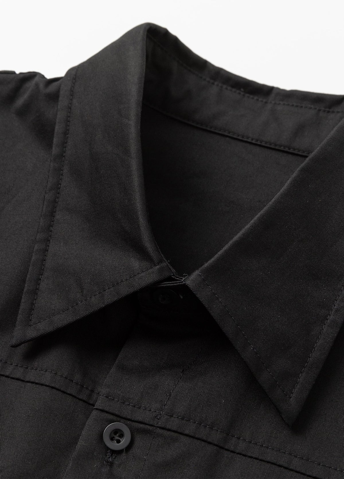 Pointed collar and button placket.