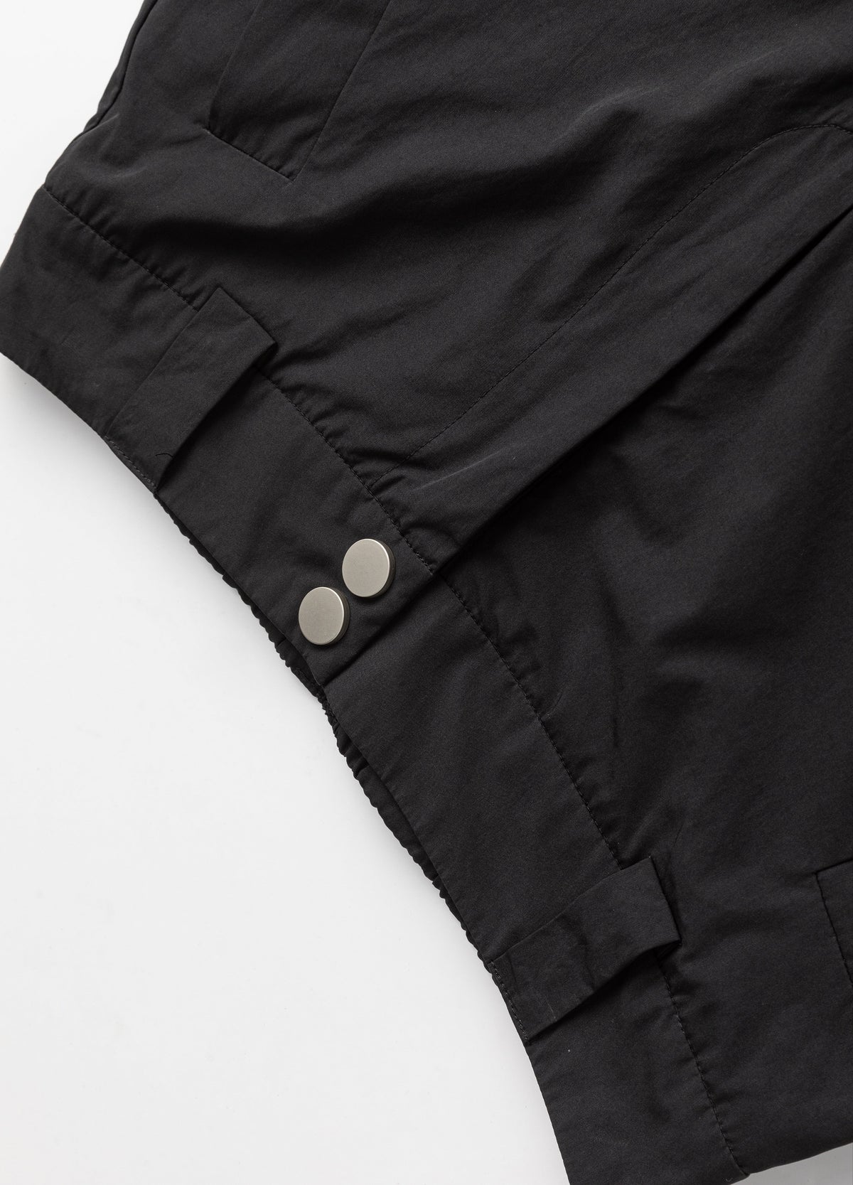 Double-snap waist closure and belt loops.