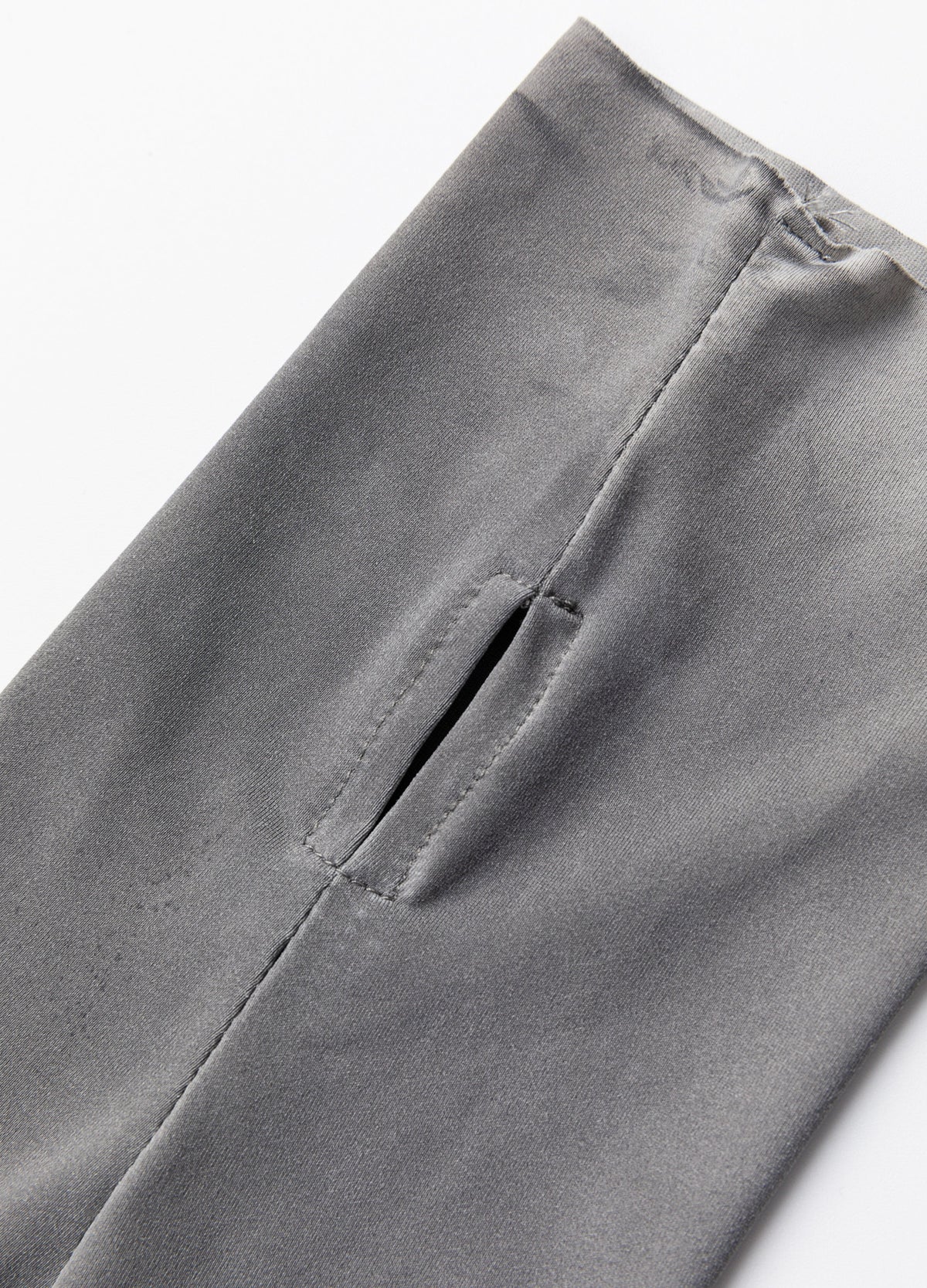 Thumb opening and sleeve seam.