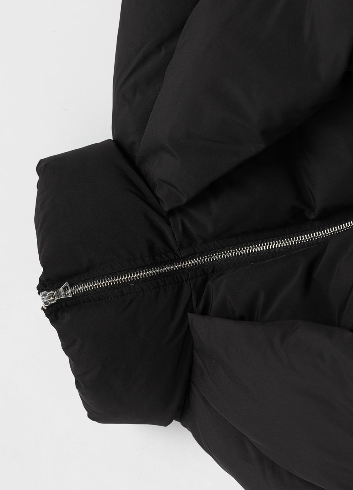 Padded stand collar and metal front zipper.