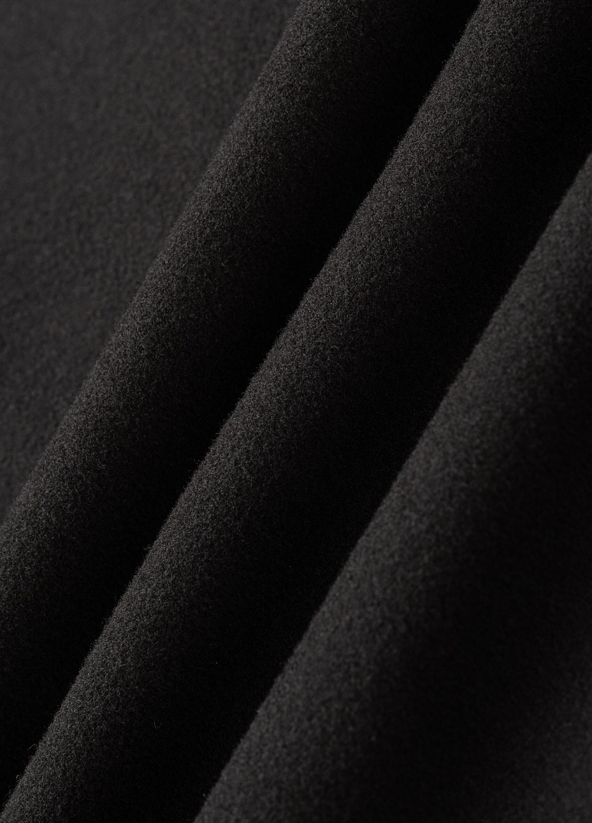 Brushed black surface.