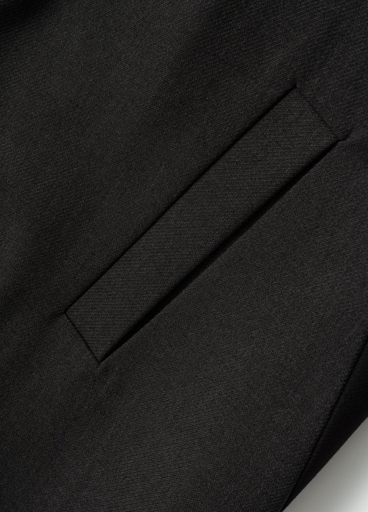 Slanted welt pocket.
