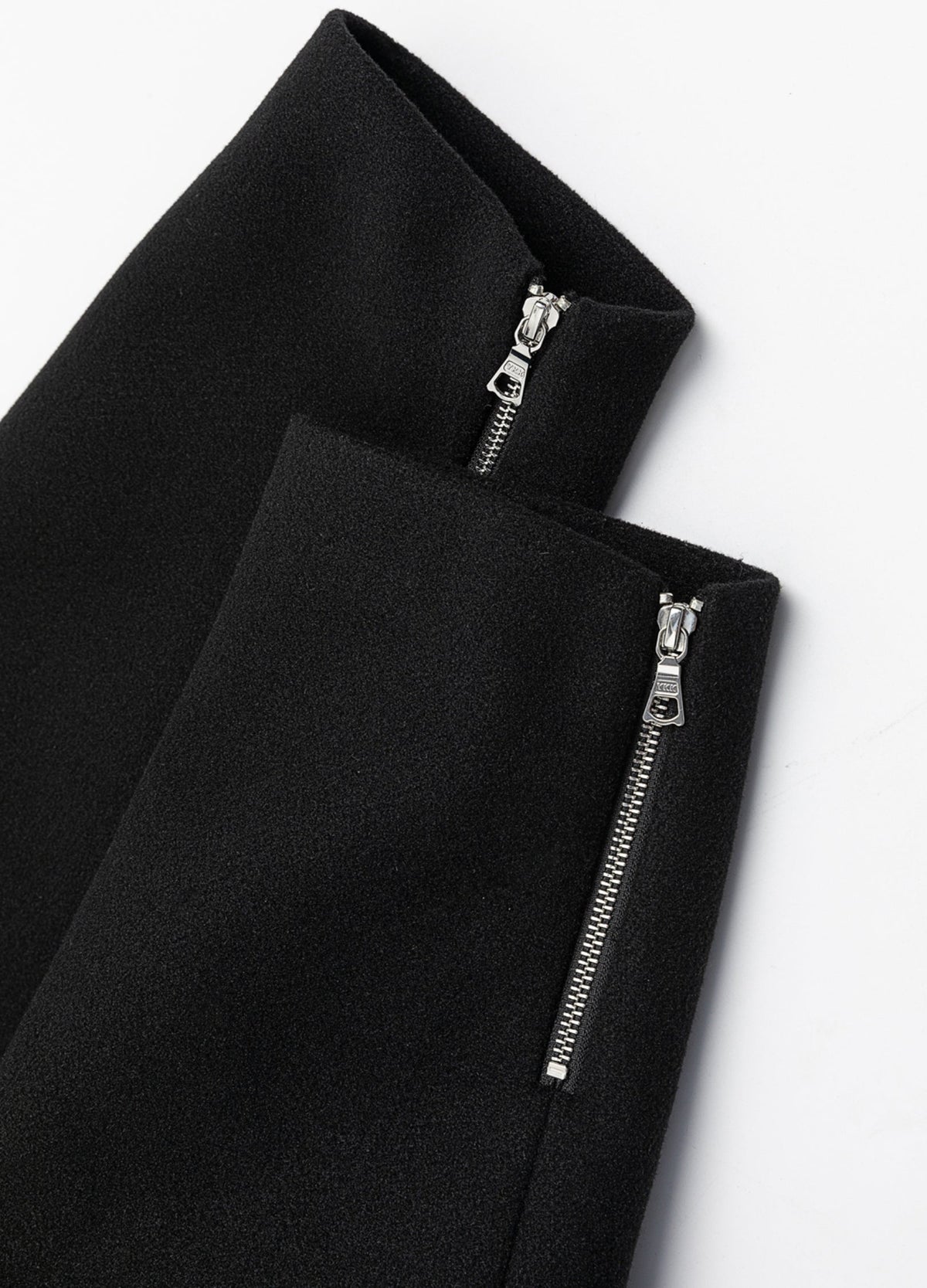 Zipped sleeve cuffs.