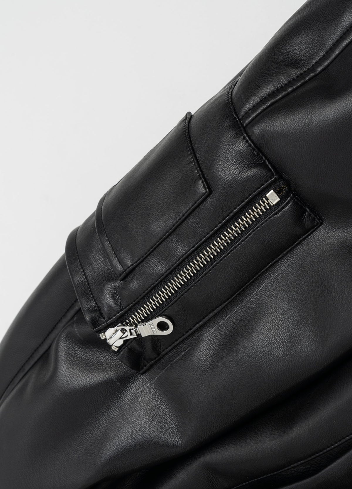 Sleeve utility pocket with metal zip.