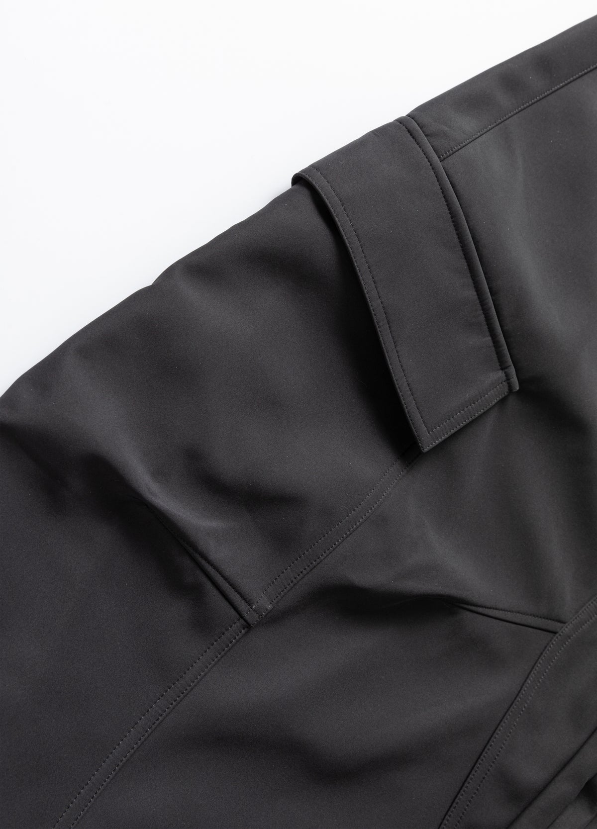 Cargo pocket flap and surrounding seams.