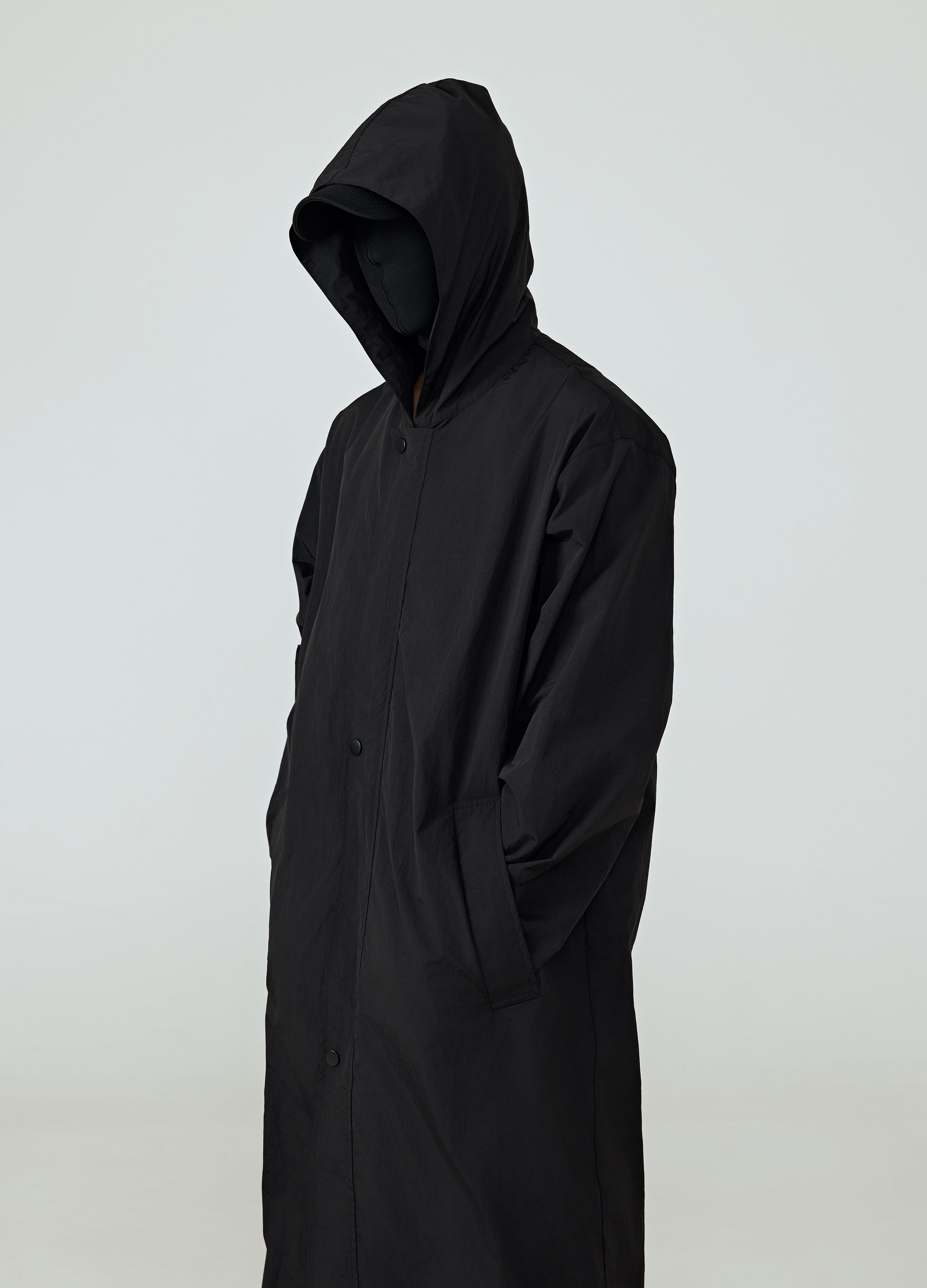 25SS DARK CASCADE HOODED TRENCH