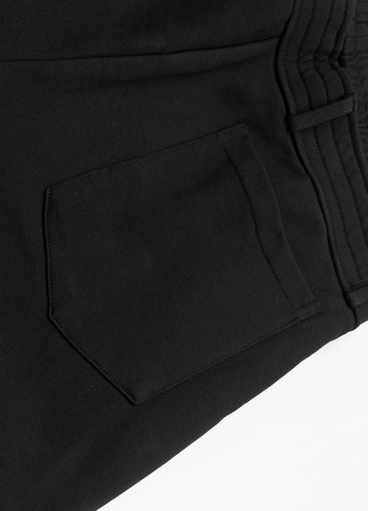 Rear patch pocket and waistband.