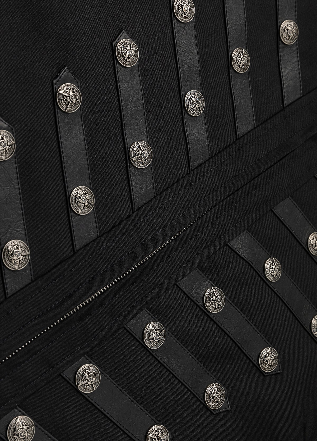 Decorative buttons beside the centre-front zipper.