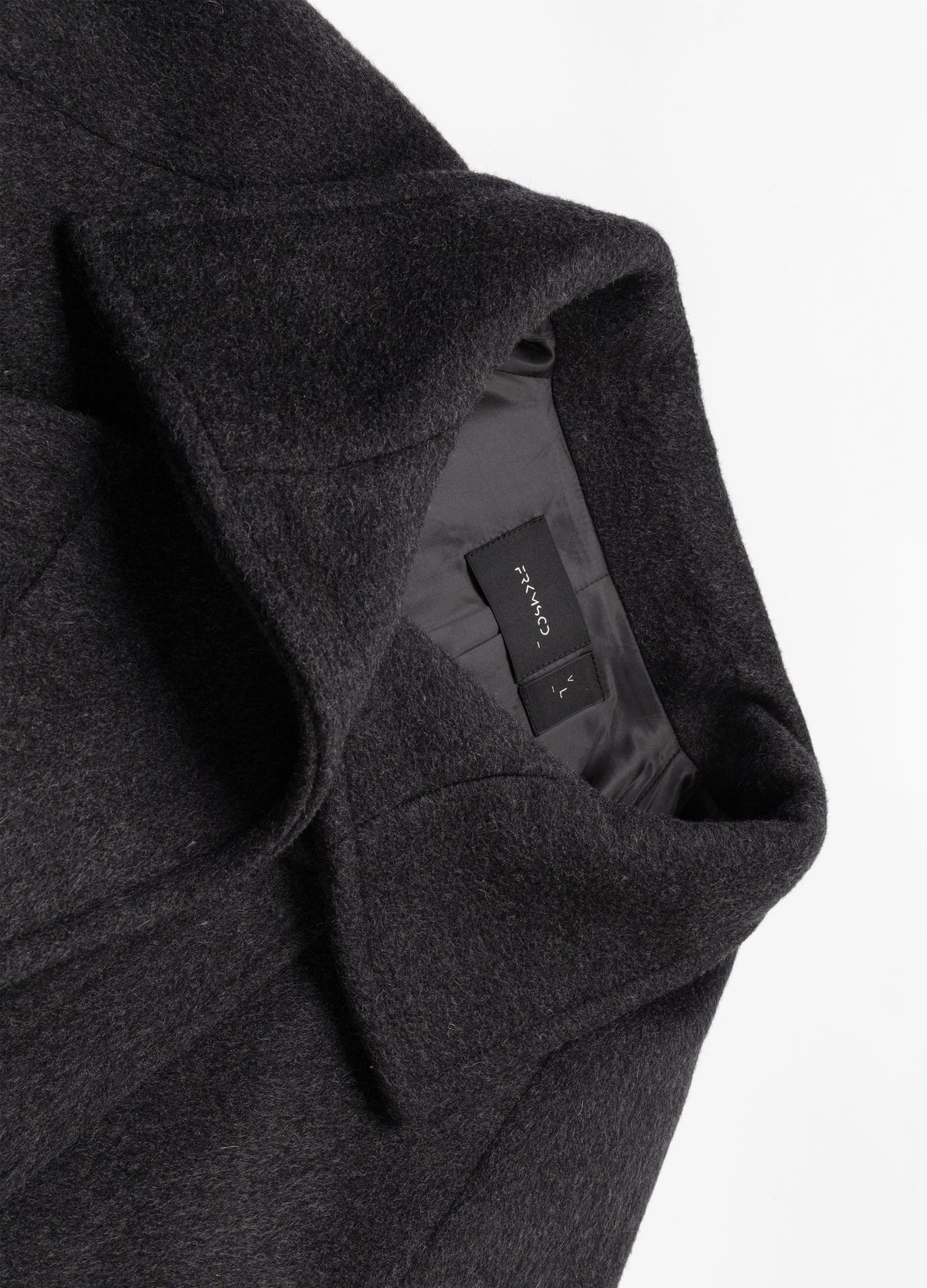 Raised collar, lapel and inner neckline.