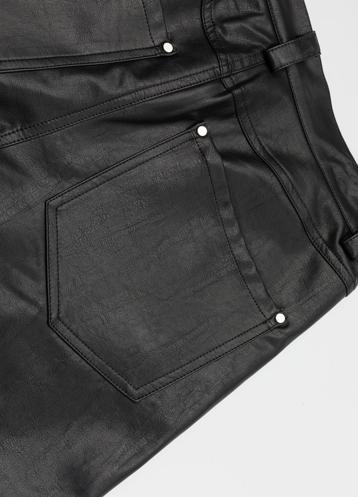 Riveted rear pockets and belt loops.