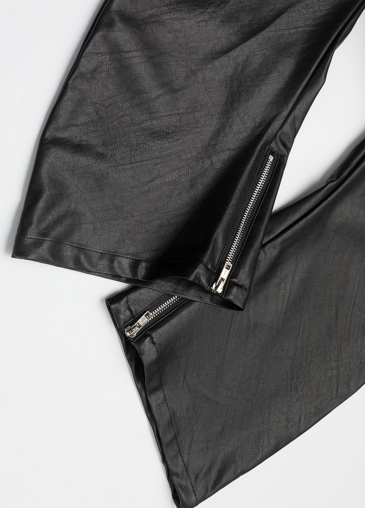 Zipped openings at the hems.