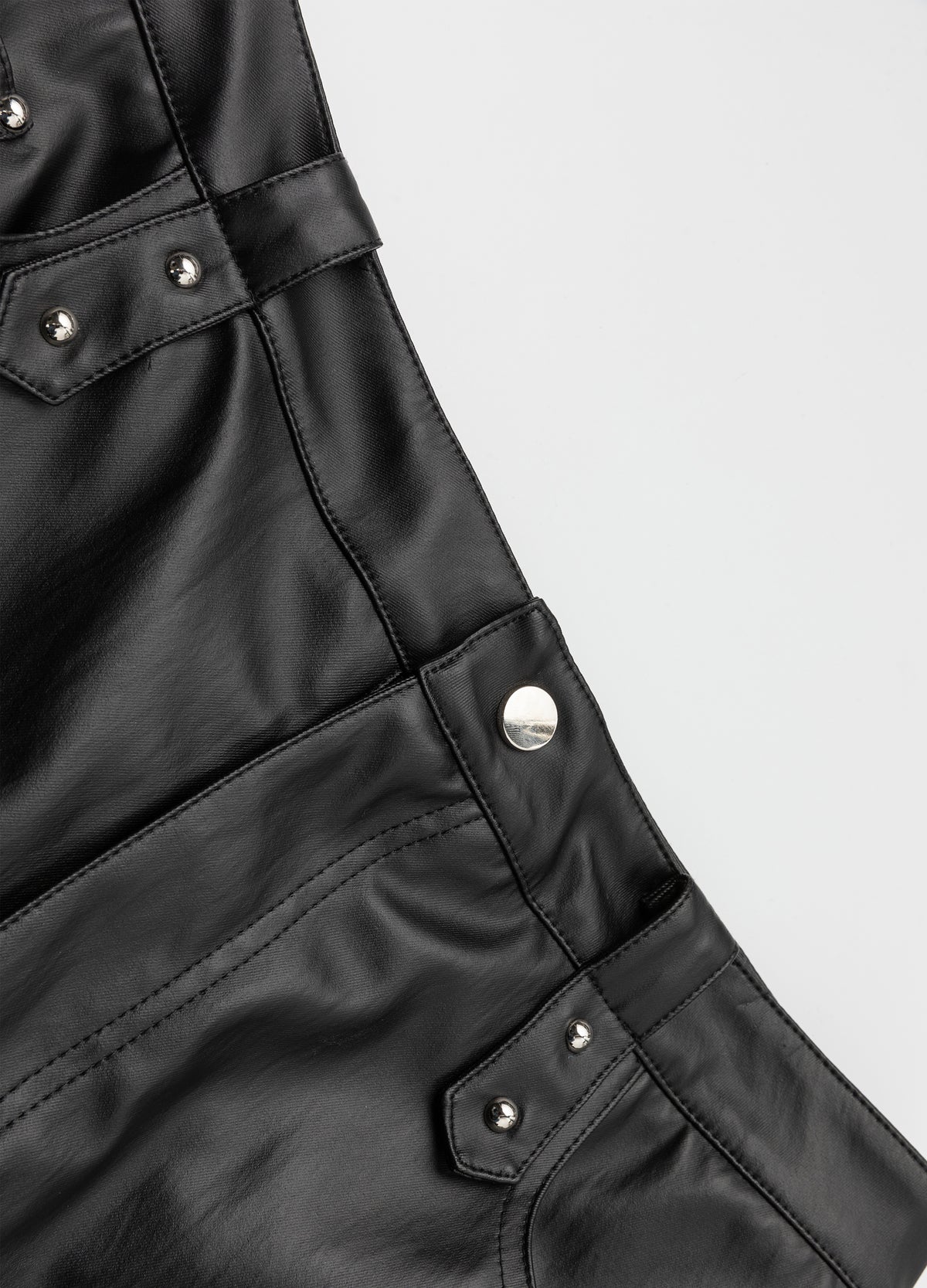 Riveted tabs at the waistband.