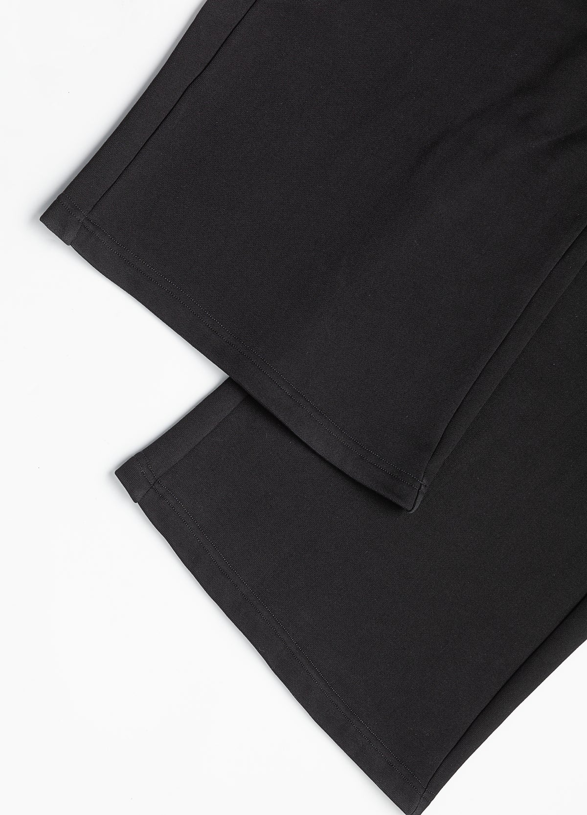 Hem stitching and leg seams.