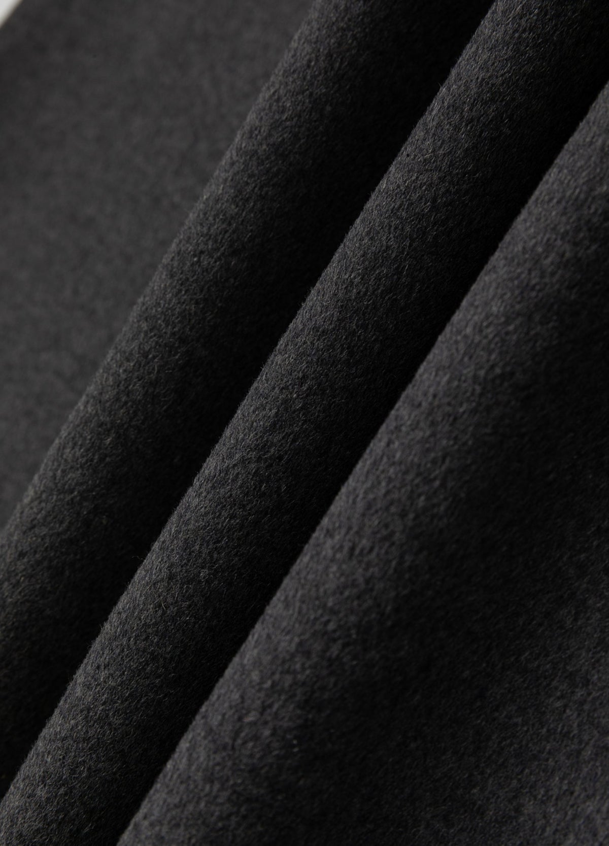 Grey brushed surface.