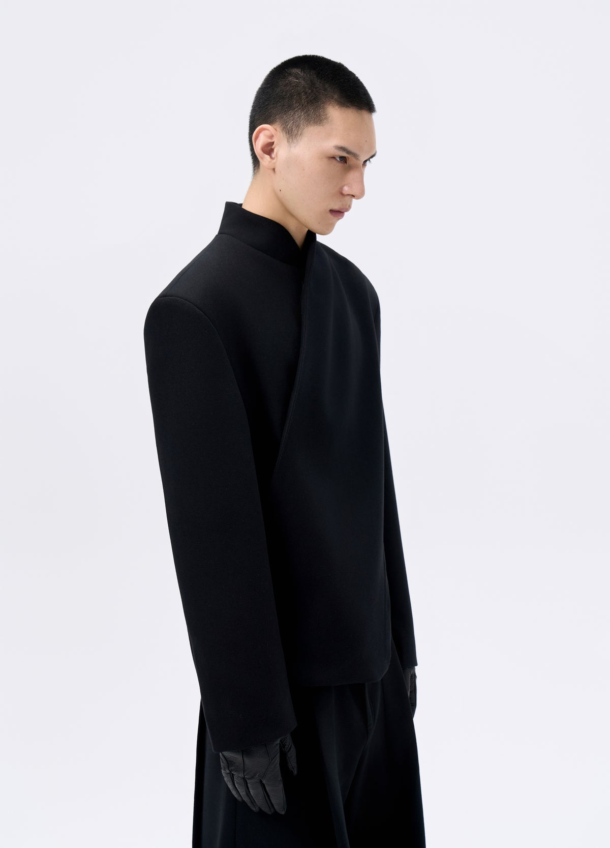 Overlapping front panels and shoulder seams.