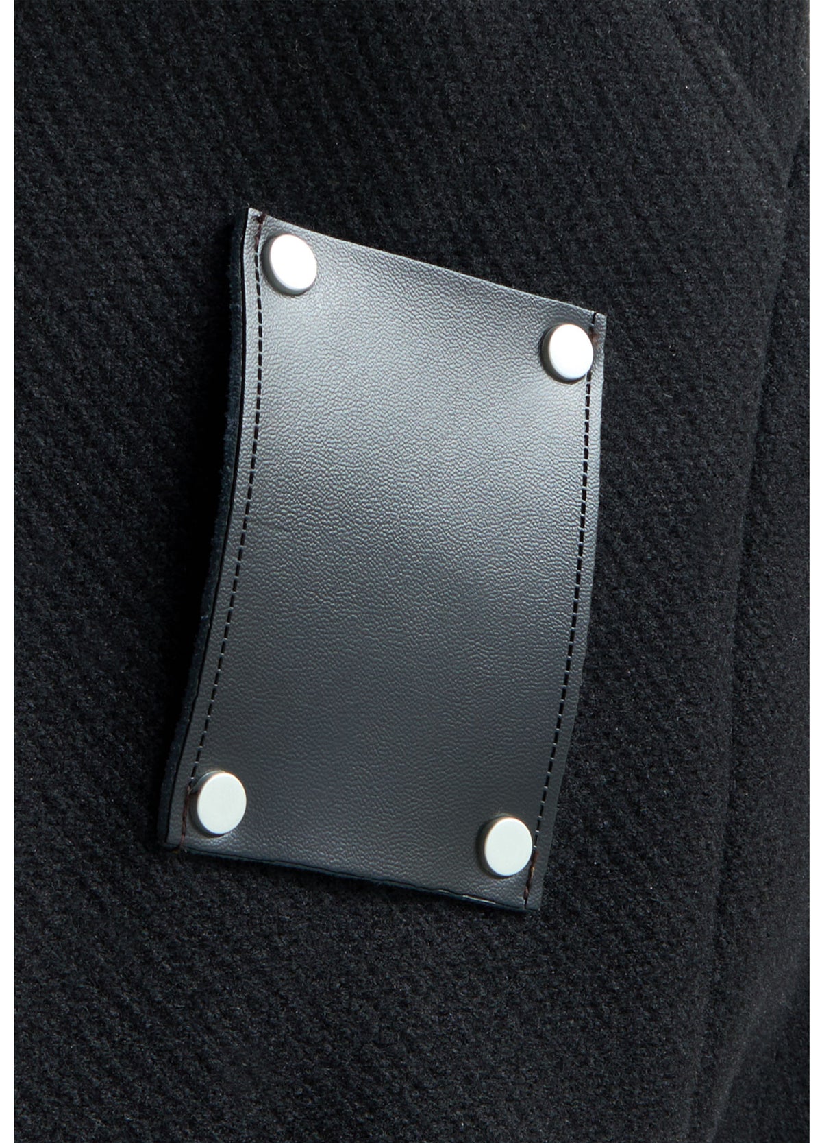Rectangular rear patch with four rivets.