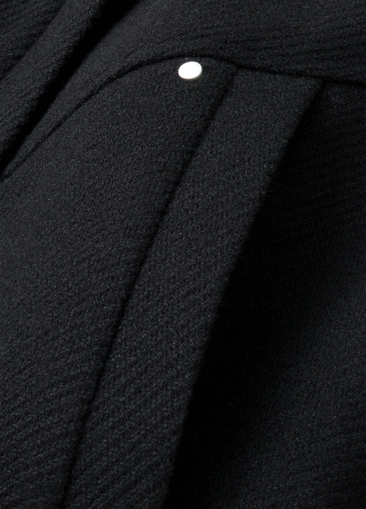 Slanted pocket opening and rivet.