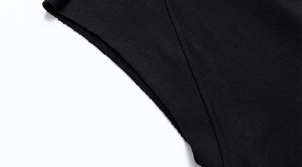 Raw armhole edge and shoulder seam.