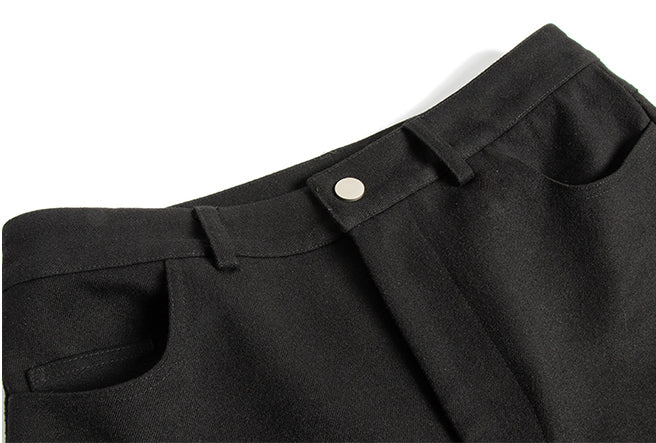 Waist button, belt loops and front pocket openings.