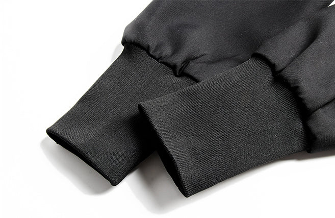 Ribbed cuffs and sleeve gathers.