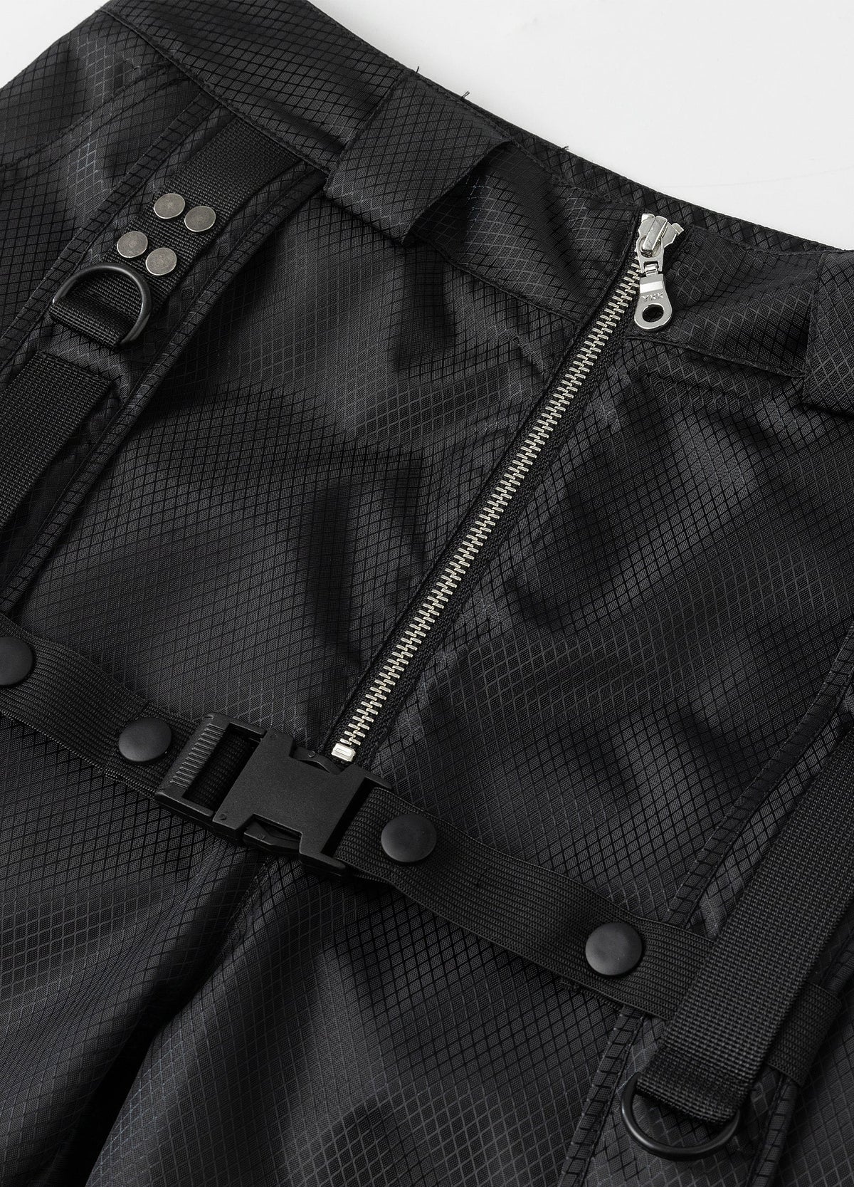 Waist zipper, belt loops and harness hardware.