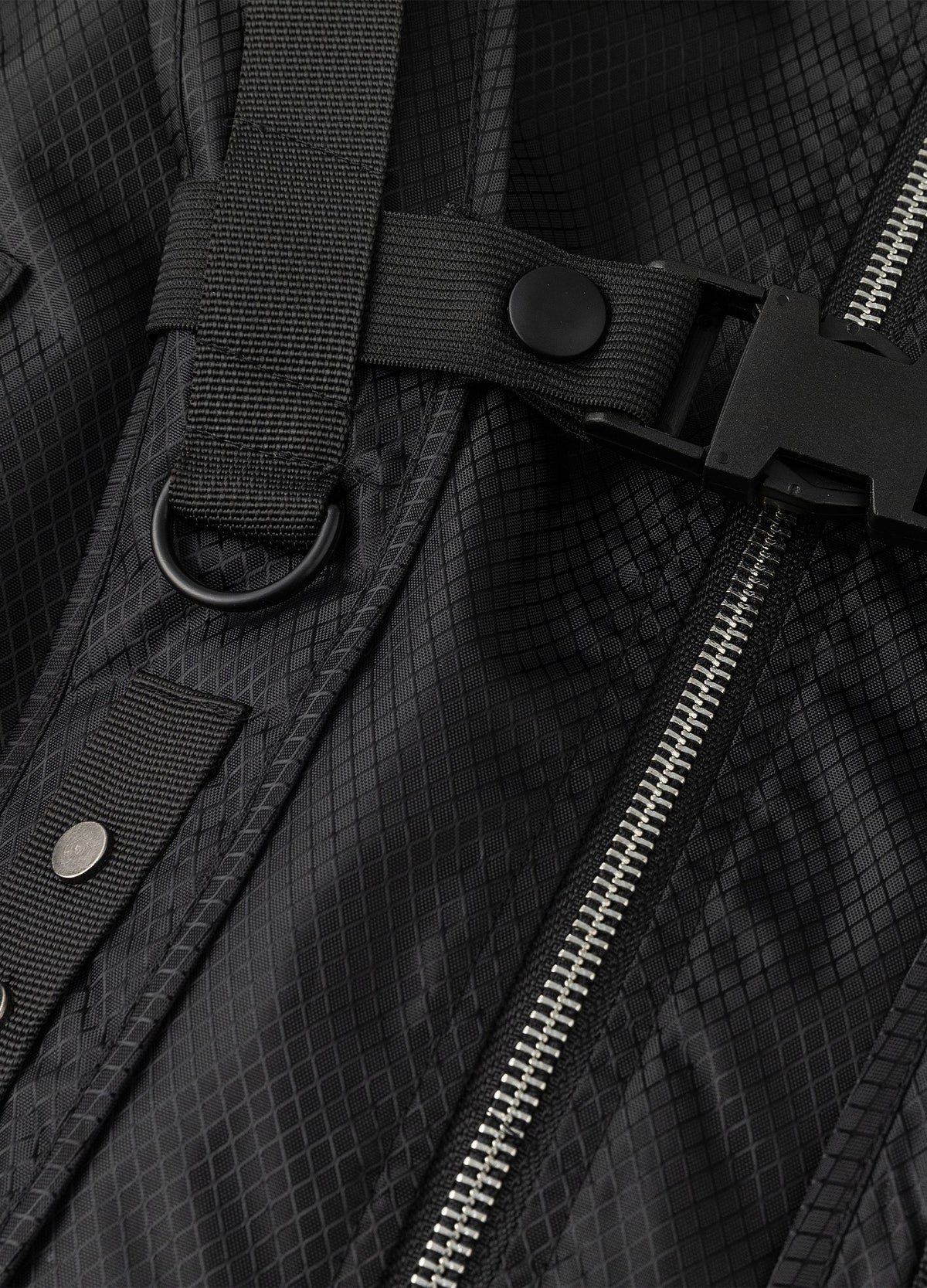Webbing straps, D-ring and chest buckle.