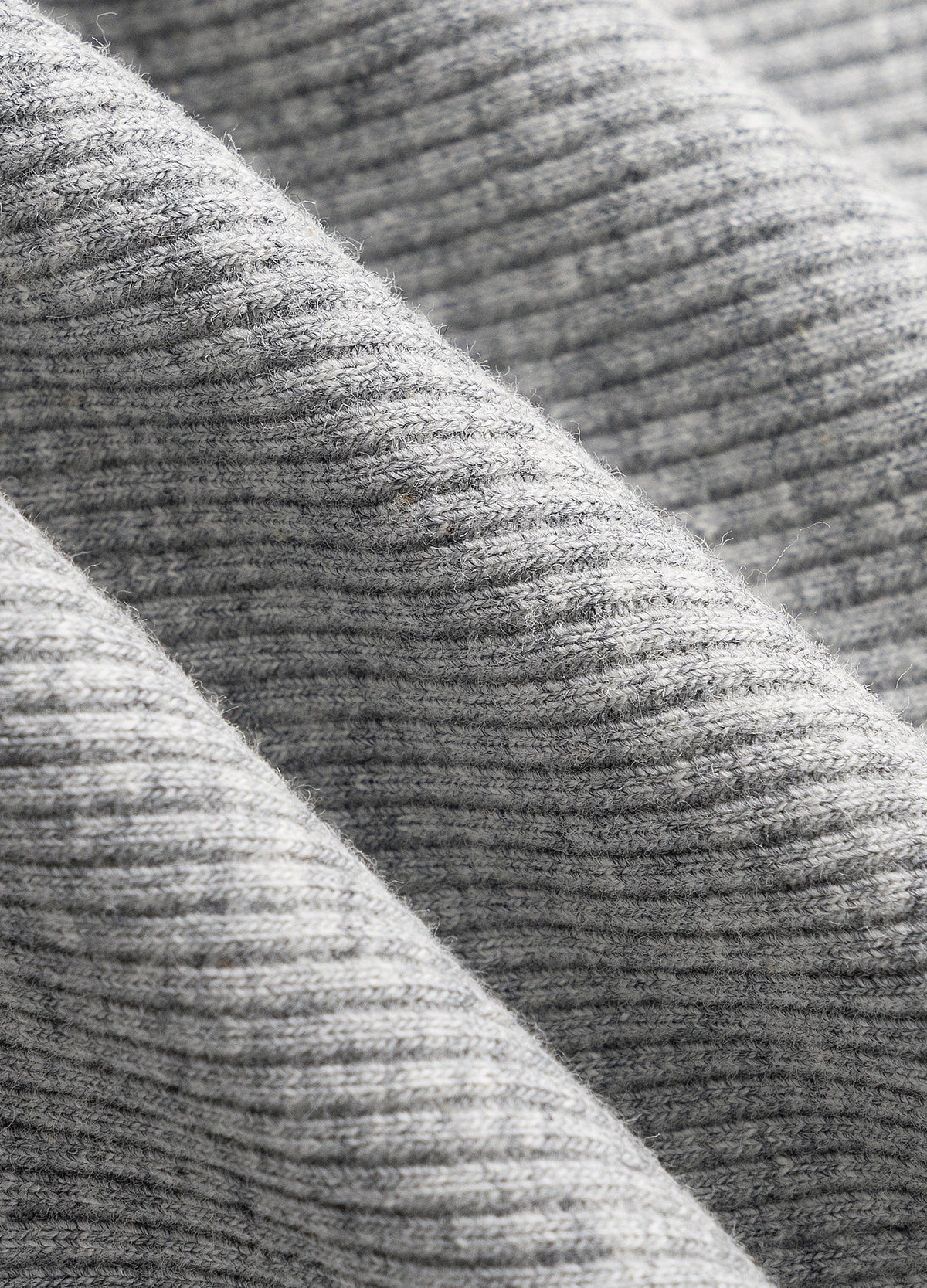 Grey rib-knit surface.